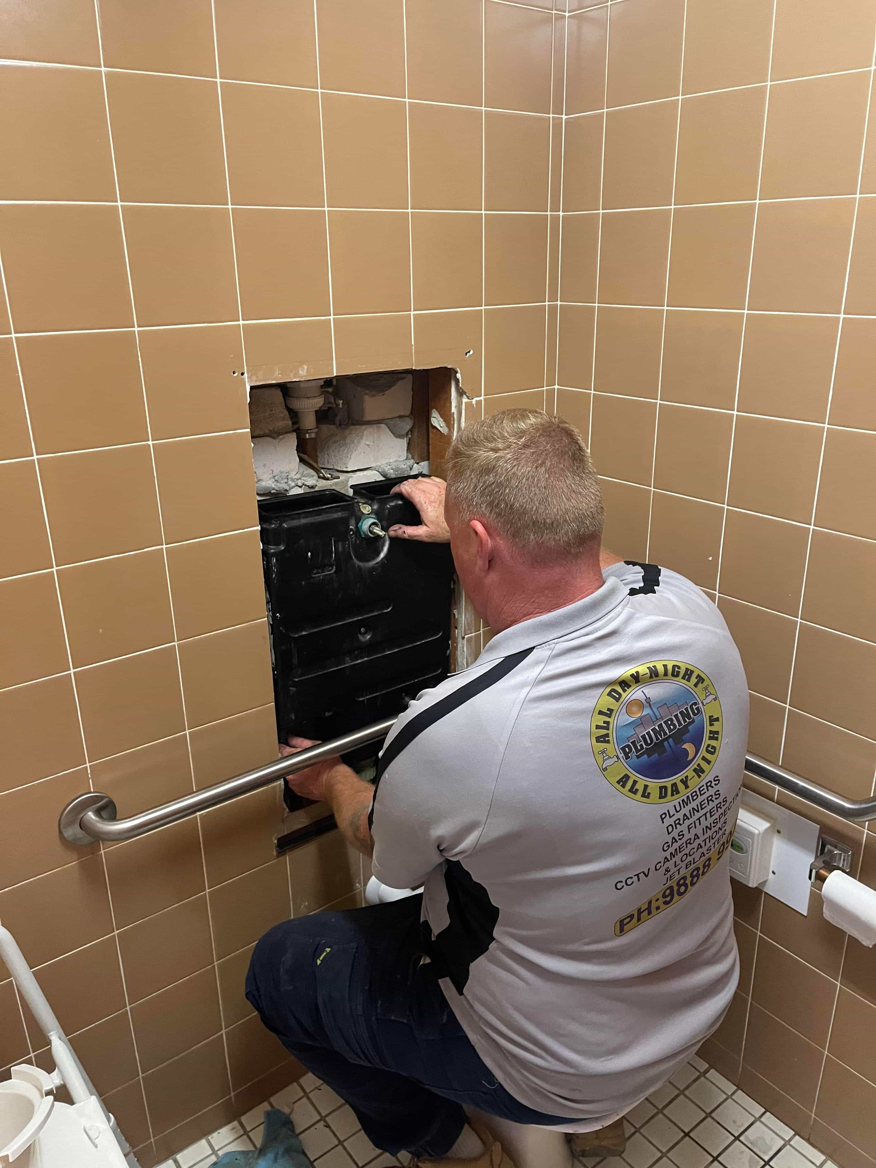 Bathroom wall opened for drain access work
