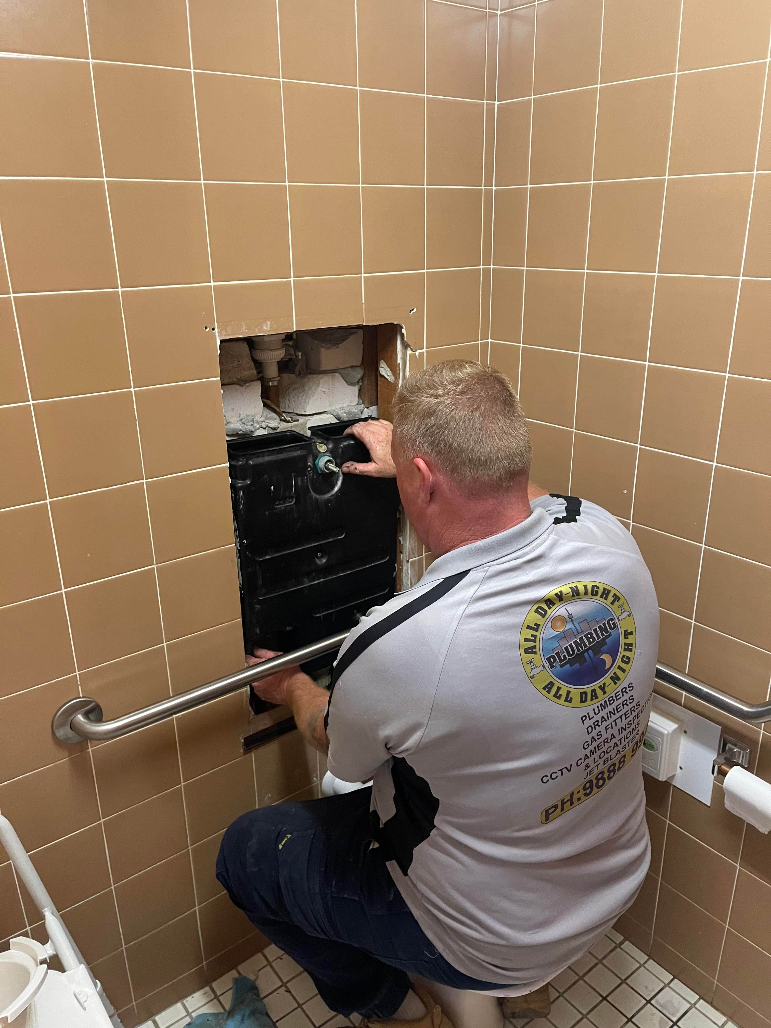 Bathroom wall opened for drain access work