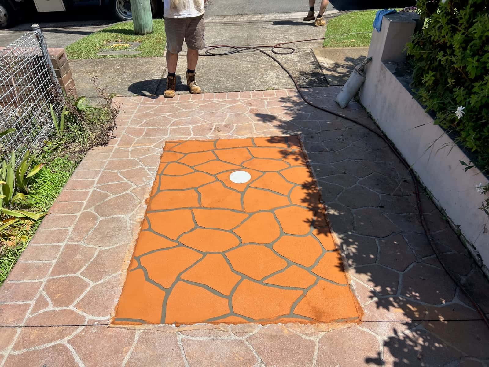 Outdoor drainage access area after surface finish