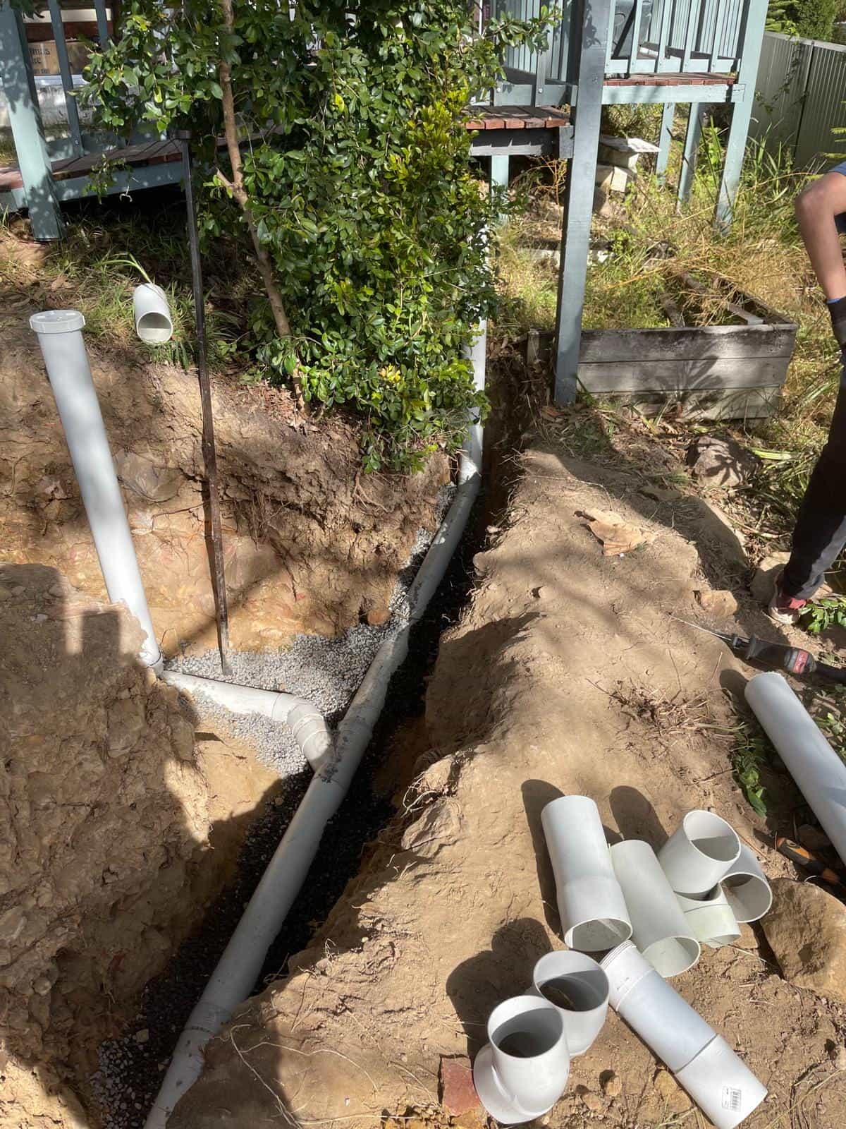 Stormwater drainage trench during backfill work