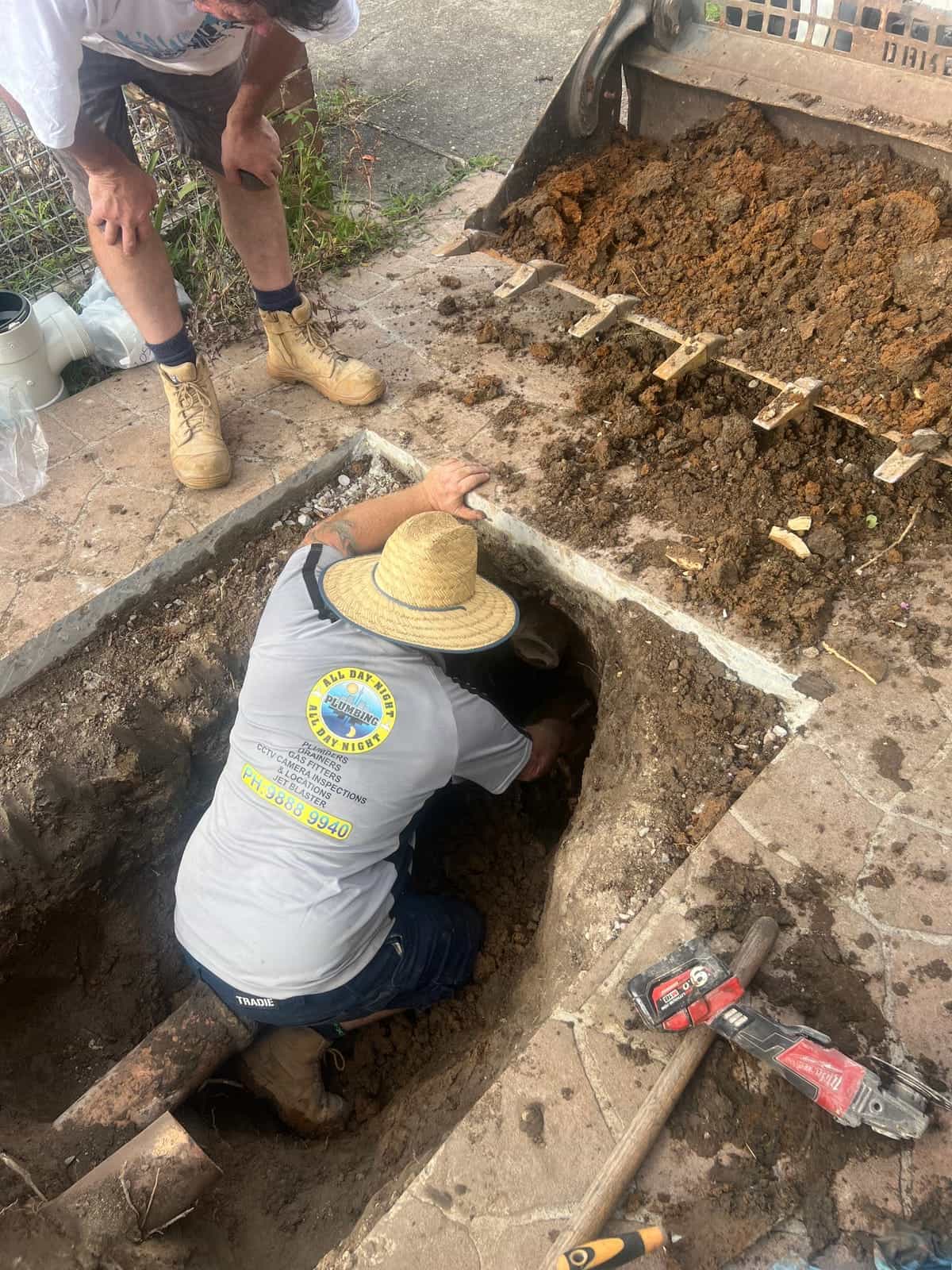 Stormwater drainage trench with pipework being installed