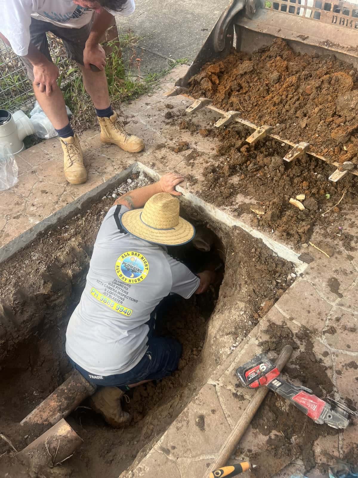Stormwater drainage trench with pipework being installed