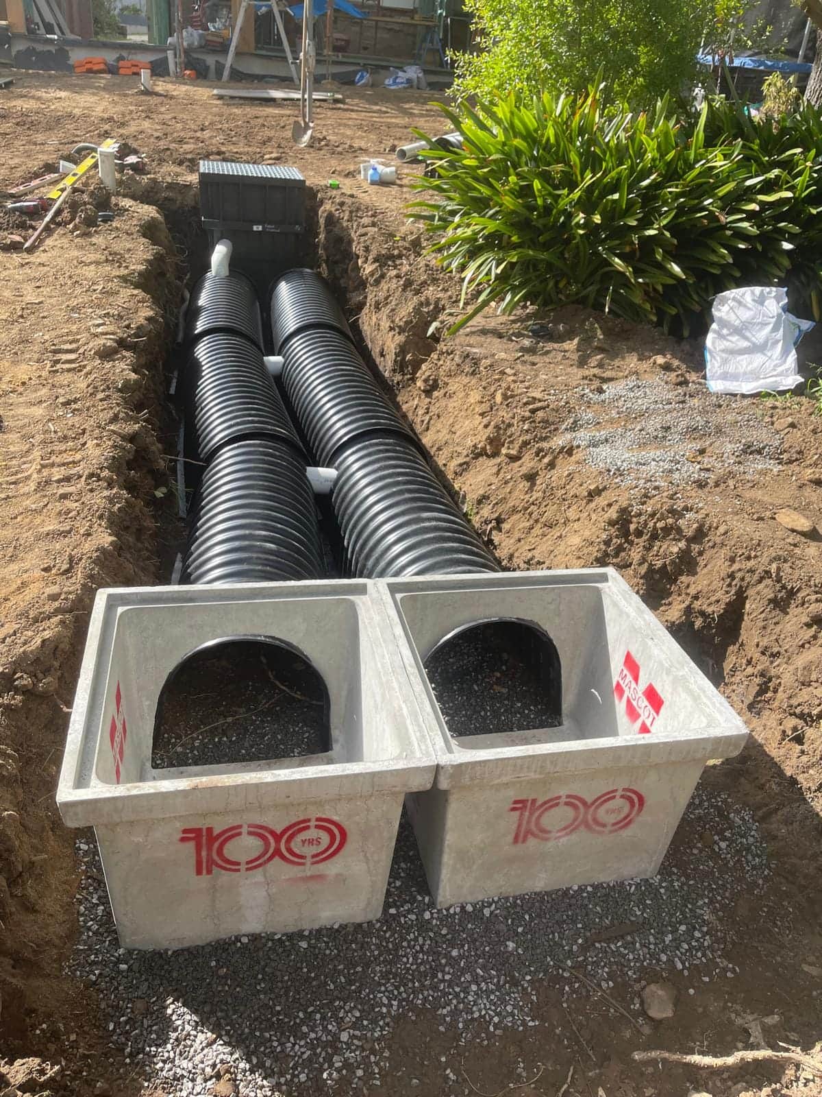 Stormwater pit and pipework exposed during installation