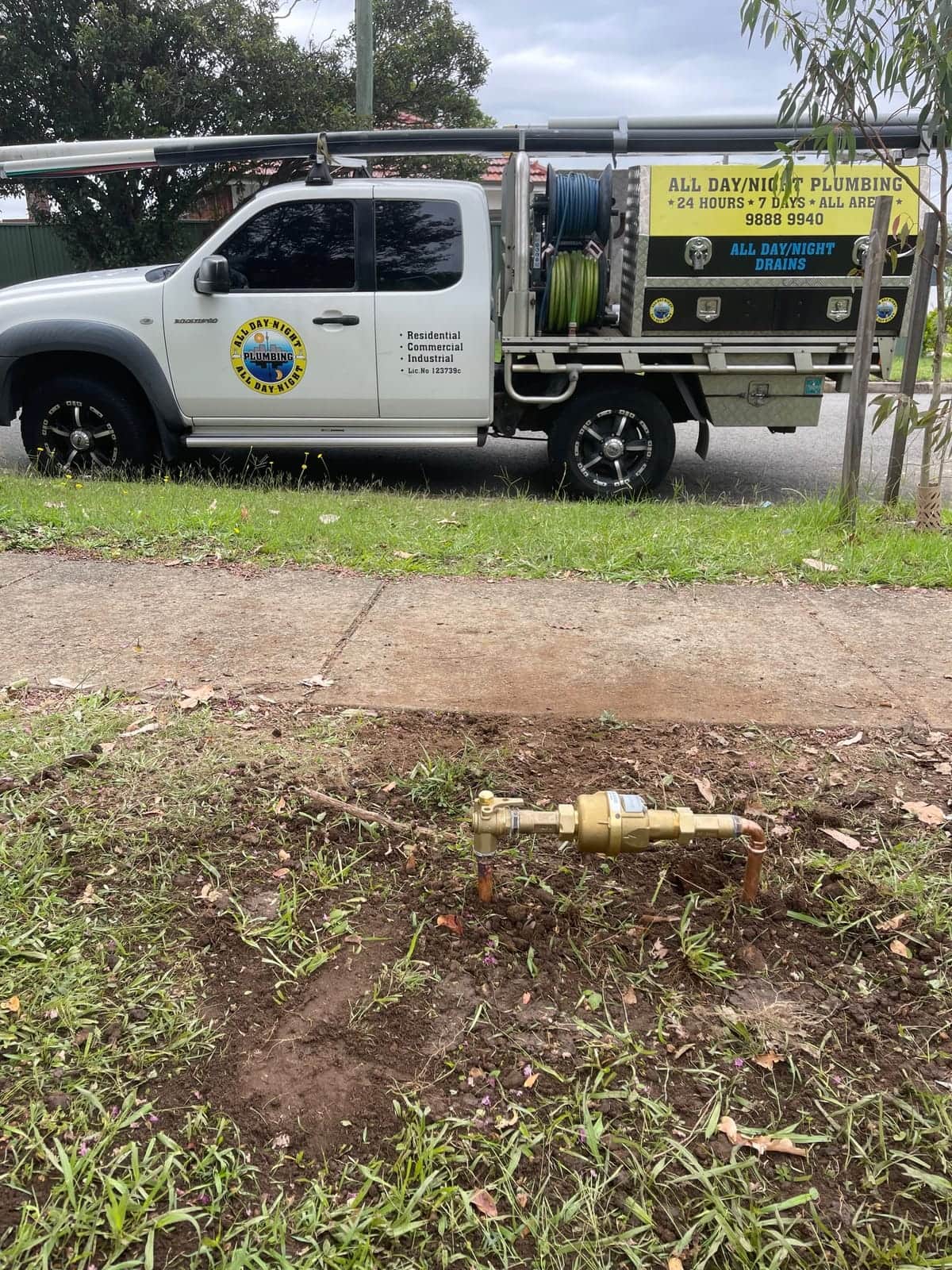 Blocked Drains Sydney branded vehicle parked near drainage equipment