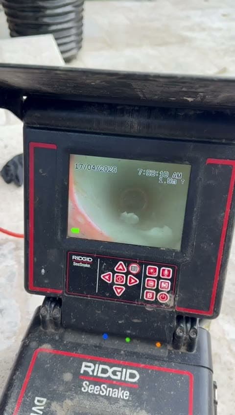 CCTV drain camera screen showing the inside of a pipe during an inspection