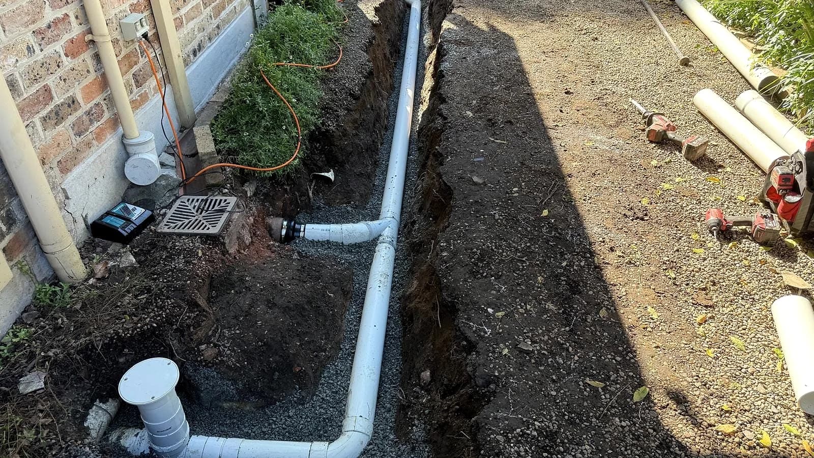 Stormwater pipework installed in a prepared drainage trench