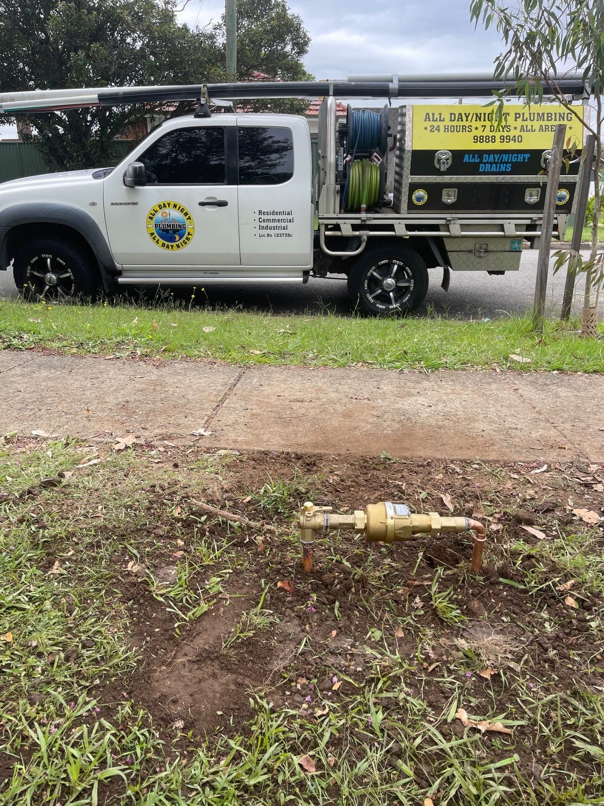 Blocked Drains Sydney branded vehicle parked near drainage equipment